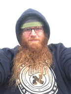 Person wearing Aleph Male branded hoodie — Jerusalem beard care lifestyle apparel